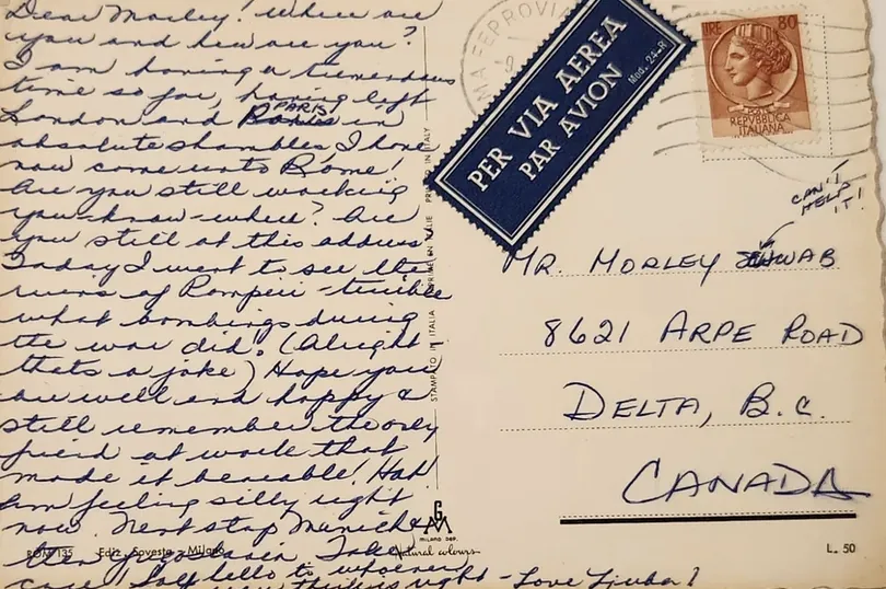 Back of the Rome postcard, handwritten, with an Italian stamp and Par Avion label